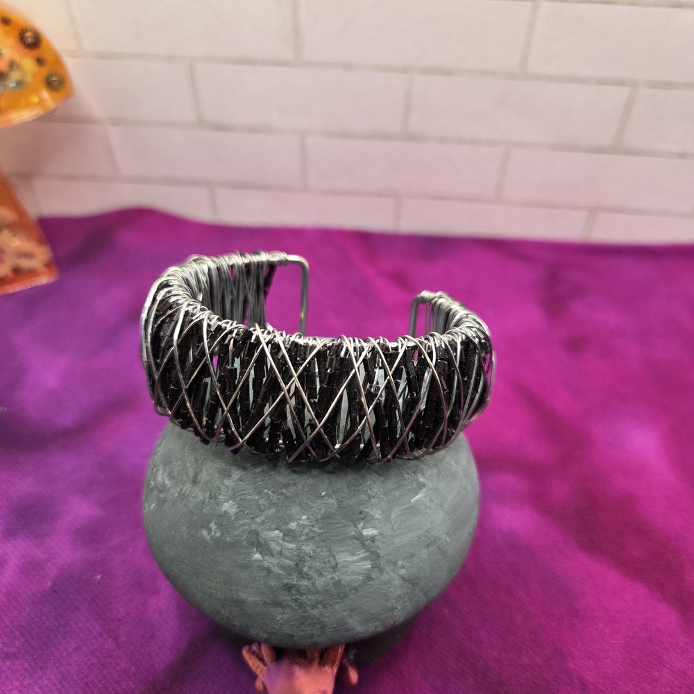 918. Black and Silver Tone Woven Wire Bracelet
